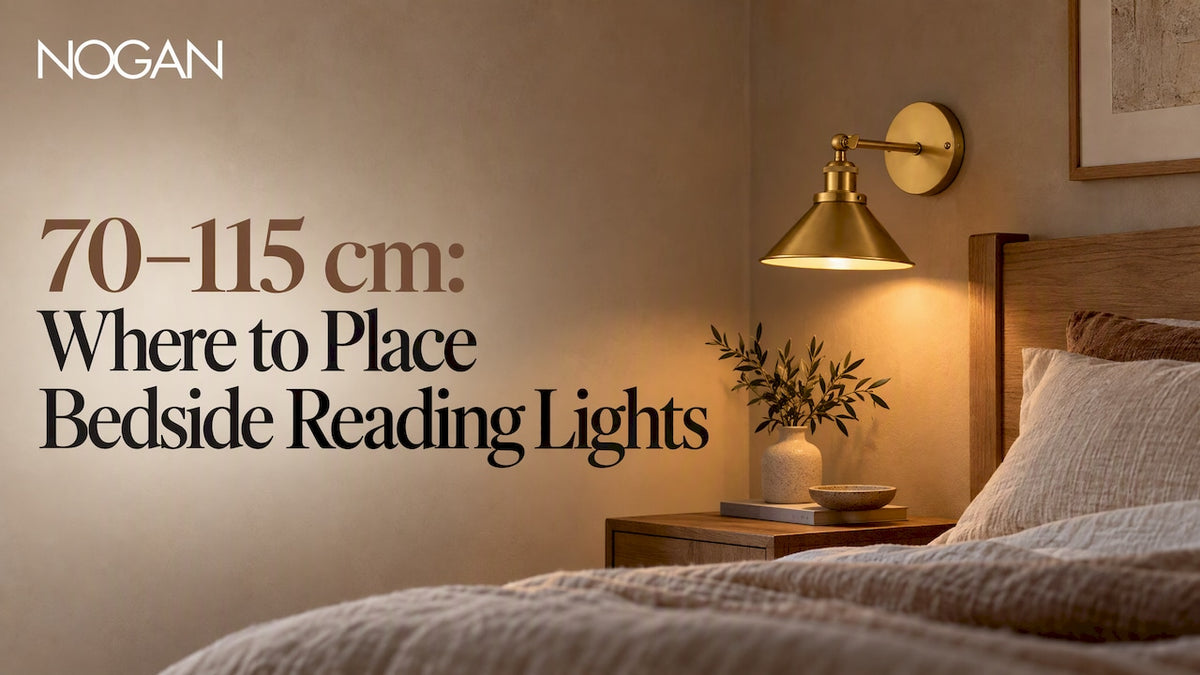 Warm brass bedside wall light beside bed