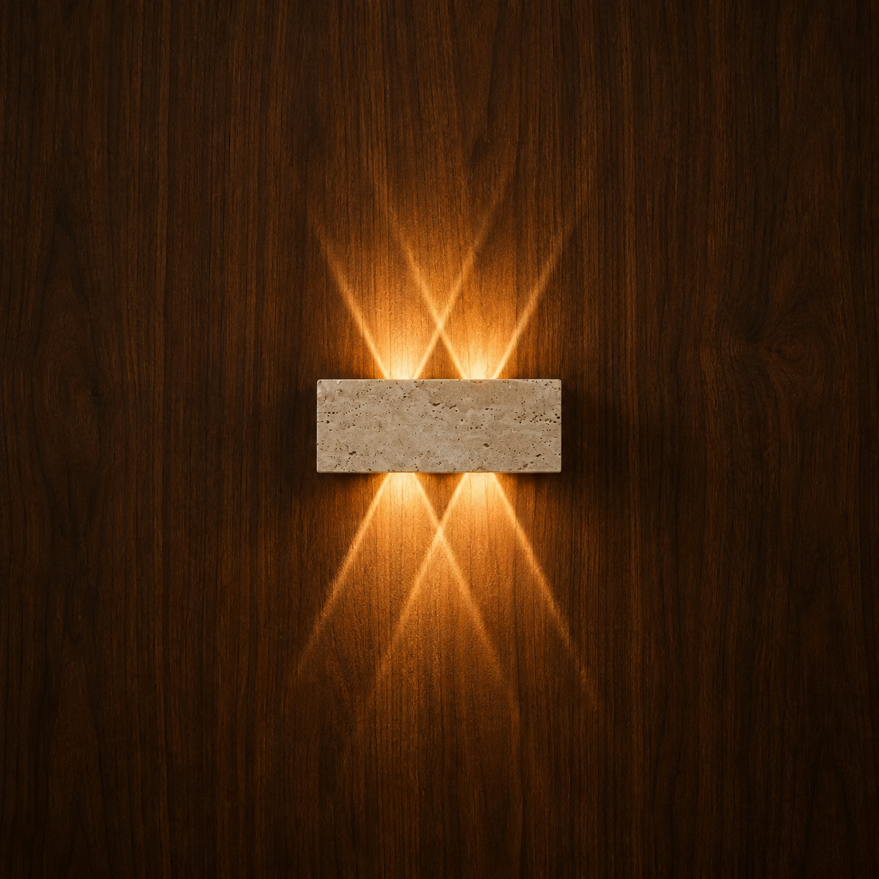 Stein travertine LED wall light glowing on a wood wall, NOGAN Lights