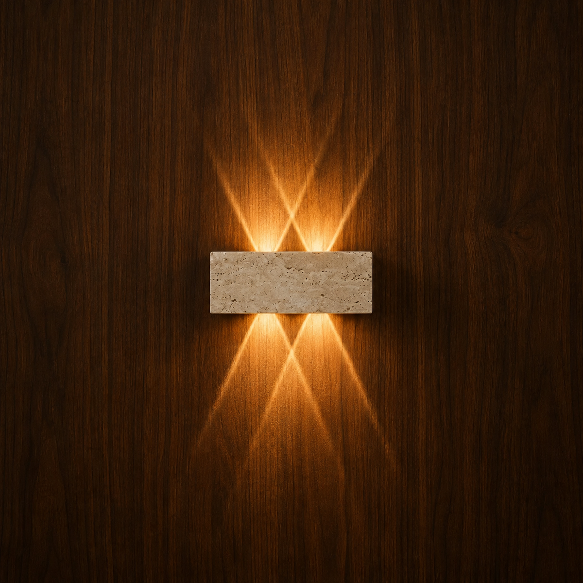 Stein travertine LED wall light glowing on a wood wall, NOGAN Lights