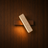 Bjørk travertine and Scandinavian wood wall light on a wood wall, NOGAN Lights