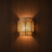 Balva natural rattan and hemp wall light on a wall, NOGAN Lights