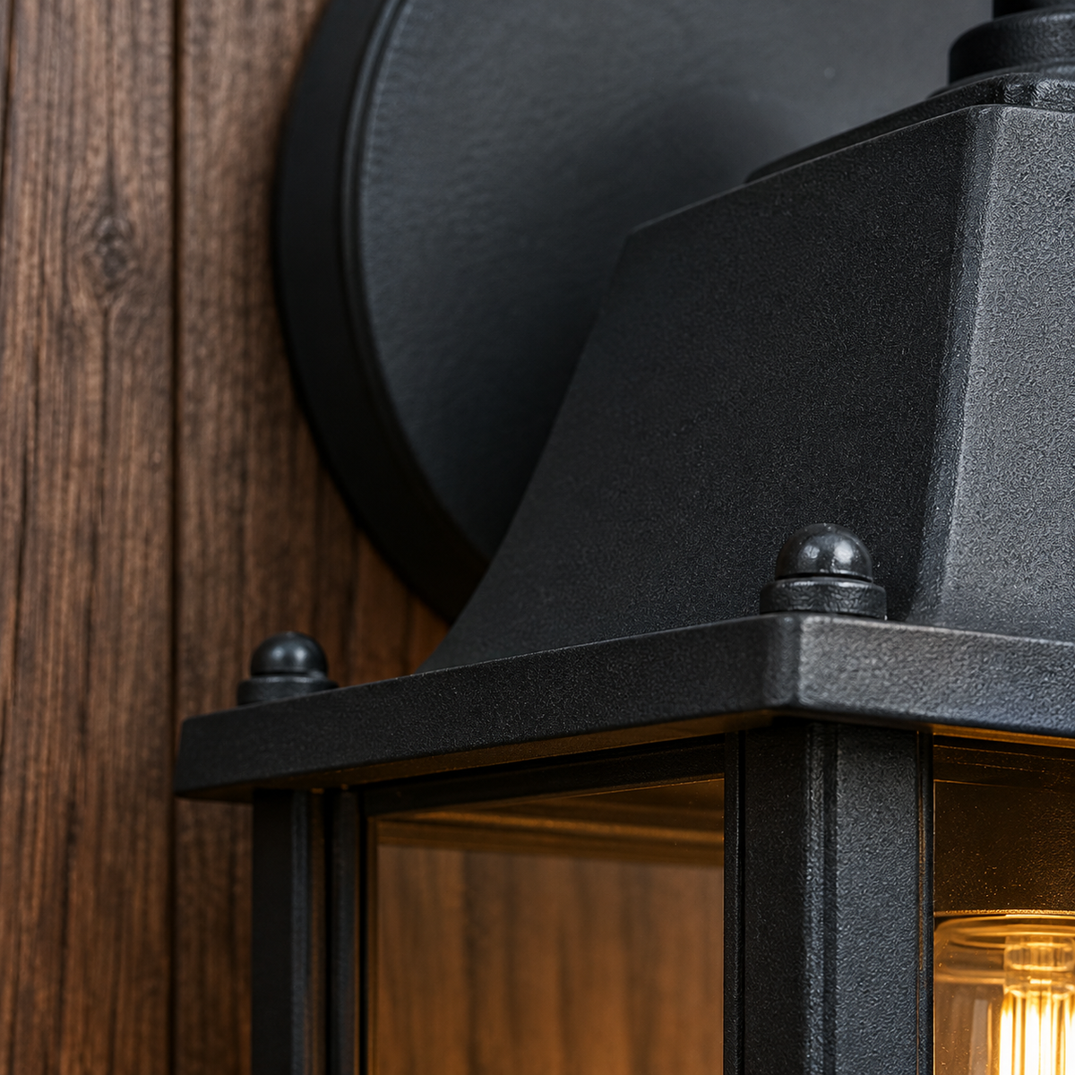 Vinter outdoor wall light lighting a patio in the evening