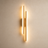 Utu designer LED wall light shown in a minimalist interior
