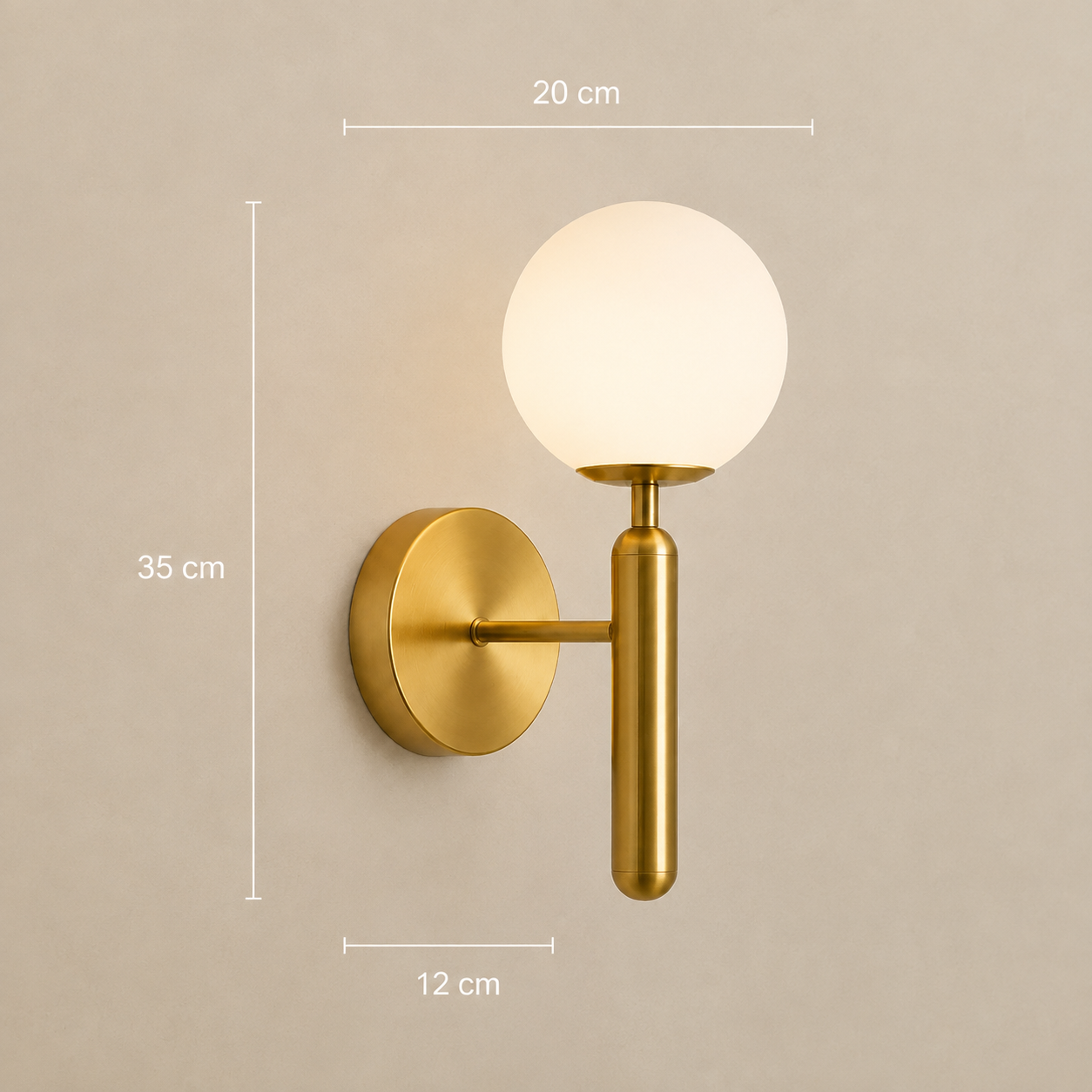 Gold designer wall light shown lit against a wall