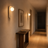Close-up of natural travertine stone texture on the Regn wall light