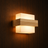 Glim designer LED wall light on a wall, NOGAN Lights