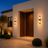 Designer LED outdoor wall light casting a warm glow beside a front door
