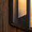 Kyst outdoor wall light lighting a pathway in the evening