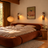 Designer Wood & Travertine Wall Light | Solberg